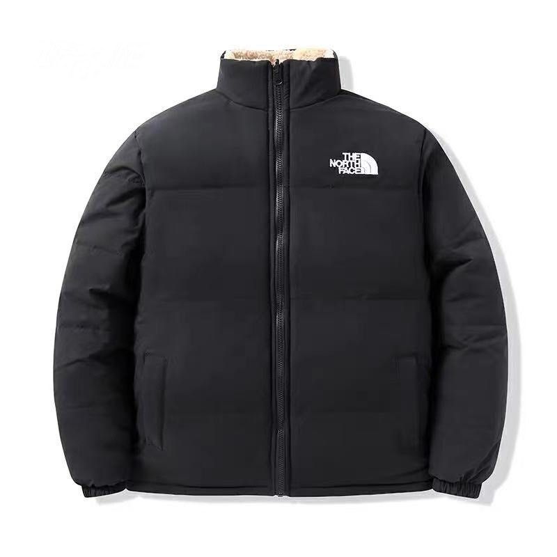 The NorthFace Two Sided Lamb Coat Unisex jacket. Black jacket with The North Face logo
