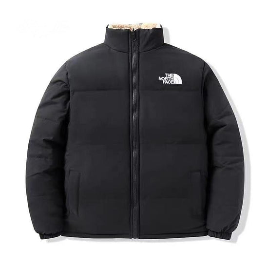 The NorthFace Two Sided Lamb Coat Unisex jacket. Black jacket with The North Face logo