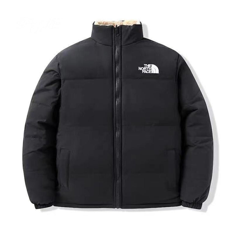The NorthFace Two Sided Lamb Coat Unisex jacket. Black jacket with The North Face logo